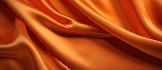 Poster - An expensive luxury fabric in a rich orange color with a velvet texture set against a background that offers ample empty space for a copy