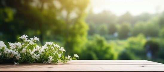 Poster - A table top with a blurred background of nature creates a serene and picturesque copy space image