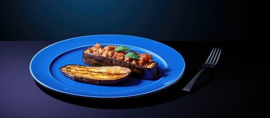 Aufkleber - The blue plate holds a copy space image of fried eggplant