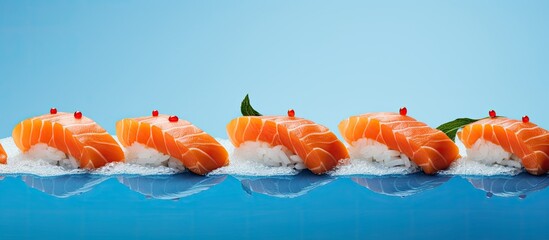 Poster - A panoramic photo captures a vibrant copy space image of delicious freshly prepared nigiri sushi featuring succulent pieces of salmon resting on a striking blue and orange surface
