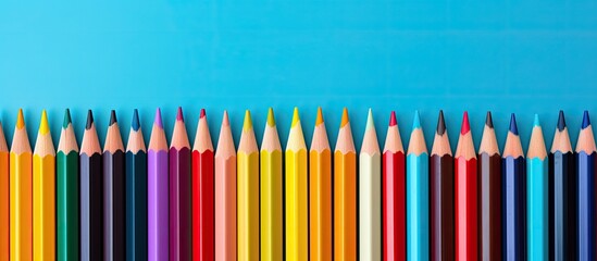 Poster - A colorful background with pencils creates a creative education concept providing a copy space image