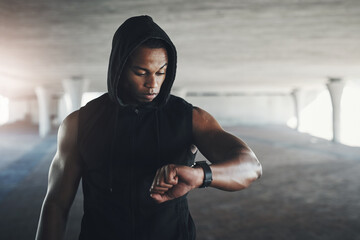 Wall Mural - Black man, athlete and smart watch for exercise monitor in parking garage for heart rate, calories or cardio. Male person, wrist and checking for fitness training or healthy progress, app or goals