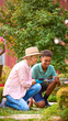 © Monkey Business - Teenage Grandson Helping Grandmother With Gardening At Home Learning About Plants And Nature
