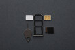 Tray with SIM and micro SD memory cards on dark gray background