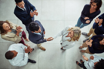 Poster - Handshake, teamwork and above of business people in office for meeting, collaboration and partnership. Corporate, professional and men and women shaking hands for agreement, b2b deal and networking
