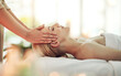 © peopleimages.com - Hands, woman and head massage at spa for health, wellness or relax for hospitality at resort. Masseuse, people and care for scalp, headache treatment and physical therapy for healing at luxury salon