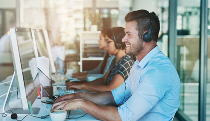 Poster - Call center, telemarketing and man at computer with customer service and crm work. Conversation, smile and phone consultant at a coworking office with headset and operator with web advice at desk