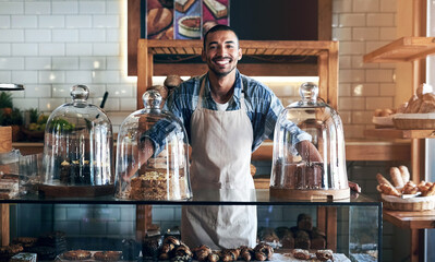 Aufkleber - Bakery, happy and portrait of man in cafe ready for serving pastry and baked foods for small business. Restaurant, coffee shop and confident waiter or barista by counter for service, help and welcome