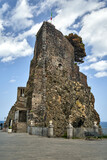 Fototapeta  - Ruins of a Norman castle on a volcanic cliff in the village of Aci Castello on the island of Sicily