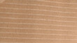 Brown corrugated cardboard texture background.