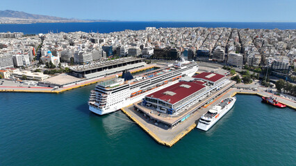 Aerial drone photo from famous busy port of Piraeus and new renovated landmark skyscraper Tower of Piraeus, Attica, Greece