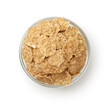 Top view of dry bran flakes in glass bowl