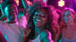 © aimired - Vibrant Young Woman Dancing with Friends at a Club