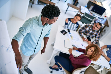 Poster - Startup, board or man in presentation for coaching, development or teaching people in office. Training, staff or designers talking for team agenda, meeting or planning in discussion for project brief