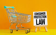 Consumer Protection Law is shown using the text and supermarket trolley