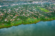 Aerial view of poor neighborhoods at the Paraguayan city of Ciudad del Este in the riverbank of the Parana river.