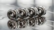 © SardarMuhammad - Ultra Realistic Image of Silver Metallic Bearings Arranged Neatly Over a Reflective Surface