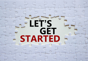 Wall Mural - Lets get started symbol. Concept words Lets get started on white puzzle. Beautiful white background. Business and Lets get started concept. Copy space.