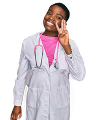 Poster - Young african american woman wearing doctor uniform and stethoscope showing and pointing up with fingers number three while smiling confident and happy.