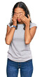 © Krakenimages.com - Young african american girl wearing casual clothes rubbing eyes for fatigue and headache, sleepy and tired expression. vision problem