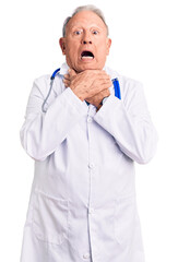 Canvas Print - Senior handsome grey-haired man wearing doctor coat and stethoscope shouting suffocate because painful strangle. health problem. asphyxiate and suicide concept.