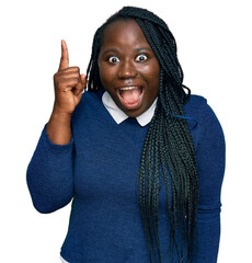 Poster - Young black woman with braids wearing casual clothes pointing finger up with successful idea. exited and happy. number one.