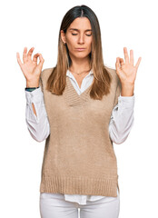 Poster - Young woman wearing casual clothes relax and smiling with eyes closed doing meditation gesture with fingers. yoga concept.