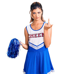 Sticker - Young beautiful woman wearing cheerleader uniform showing middle finger, impolite and rude fuck off expression