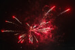 Beautiful colorful fireworks against a dark sky background. Selective focus, background, texture