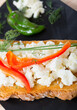 Tasty sandwich in Bulgarian style with brynza, bell pepper and greens