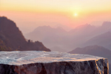 Aufkleber - Sunset casting a warm glow on a rocky with a view of layered mountain ranges. High quality photo