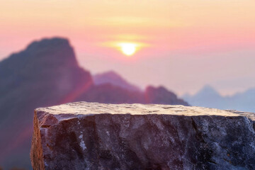 Poster - Sunset glow over a textured stone surface with mountain background. Perfect for product display. High quality photo
