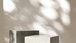 Two modern concrete cement gray cuboid table podium in sunlight on white wall room. Luxury cosmetic, skincare, beauty, body, hair care, treatment, fashion product display background 3D
