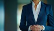 © kitidach - Construct an image of a female CEO wearing a formal black suit, torso visible, with hands gesturing openly
