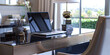 © Lila Patel - Fashion Forward Focus: A stylish desk showcasing the latest trends in home office design, including a luxury laptop, sleek accessories, and a statement chair, highlighting California's fashion sense