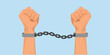 Metal handcuffs on hands.