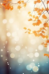 Wall Mural - Dry Yellow Leaves and Tree Branches on Blue and Orange Gradient Blur Bokeh Background. Copy Space for Autumn Banner or Poster