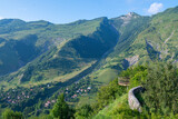 Fototapeta Tęcza - Verdant Majesty: Green Mountains against a Blue Backdrop