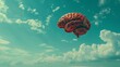   A floating human brain in an airy setting against a backdrop of a blue sky and puffed clouds