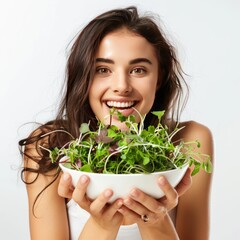 Wall Mural - Photography of young woman eating a micro greens salad enjoying the dish isolated on white background  
