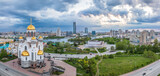 Fototapeta Nowy Jork - Summer Yekaterinburg and Temple on Blood in beautiful clear sunset.. Aerial view of Yekaterinburg, Russia. Translation of the text on the temple: Honest to the Lord is the death of His saints.