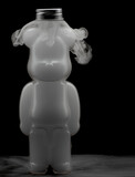 Fototapeta  - Plastic teddy bear bottle filled with swirling mist and fog creating strange effects shapes and textures