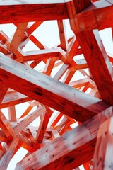 Sticker - A close up of a wooden structure with red and white stripes