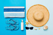 Top view travel or vacation concept. Composition with stylish beach accessories on colored background, top view. Beach fashion flat lay, summer concept. Trendy colors