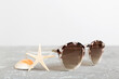 sunglasses with seashell lying on table background. Sunglasses on summer background. Top view flat lay with copy space for text
