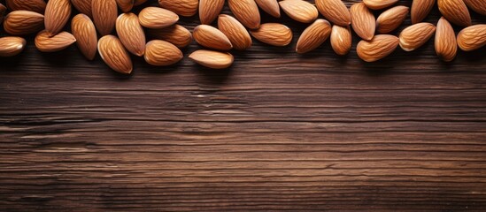Aufkleber - Copy space image of almonds arranged on a rustic wooden table