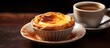 A copy space image showcasing Pastel de Nata a delightful Portuguese dessert known for its small and crunchy puff pastry pies filled with a creamy egg based custard It is typically enjoyed alongside