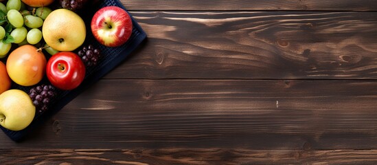 Poster - A top view of fitness and healthy food concept with sneakers towel and a drink bottle placed on a wooden table providing copy space for your text