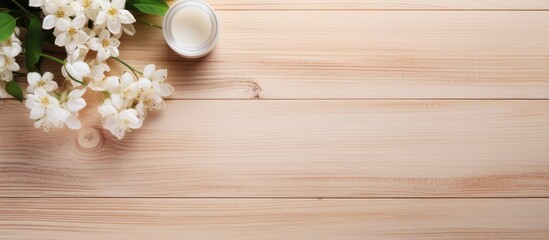 Poster - On a light wooden backdrop there is a copy space image featuring face cosmetics nail polish and white fresh flowers