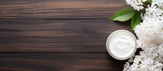 Poster - A bright wooden table background showcasing cosmetic creams and a beautiful white lilac blossom Copy space image